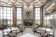 Hotel lobby with fireplace, tables and chairs